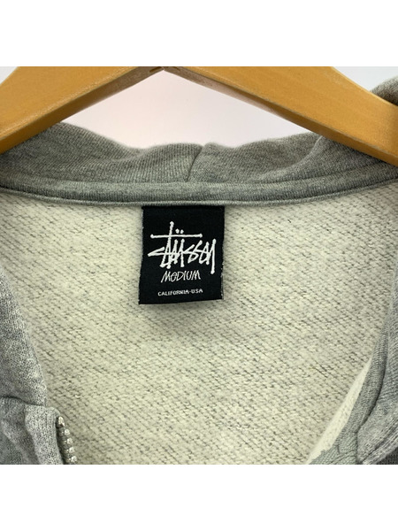 STUSSY パーカー（ジップアップ） バックロゴプリント　ジップパーカー グレ